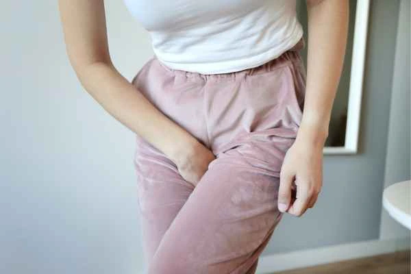 woman struggling with urine incontinence Wokingham