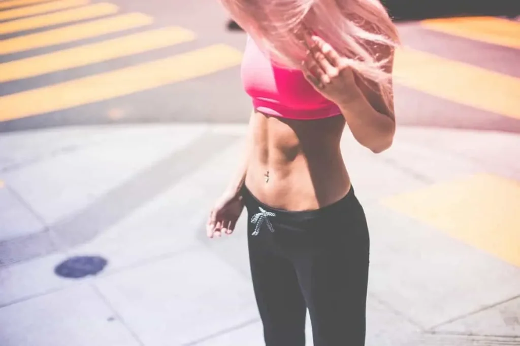 Woman with toned stomach after LA-EMS Body Sculpting Treatment Wokingham